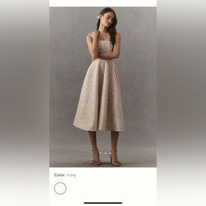 Helsi Vivi Strapless Beaded Fit & Flare
Midi Dress